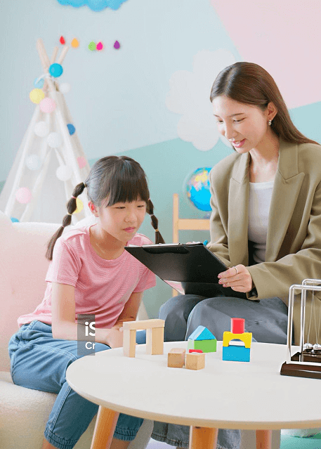 Child with autism learning and playing